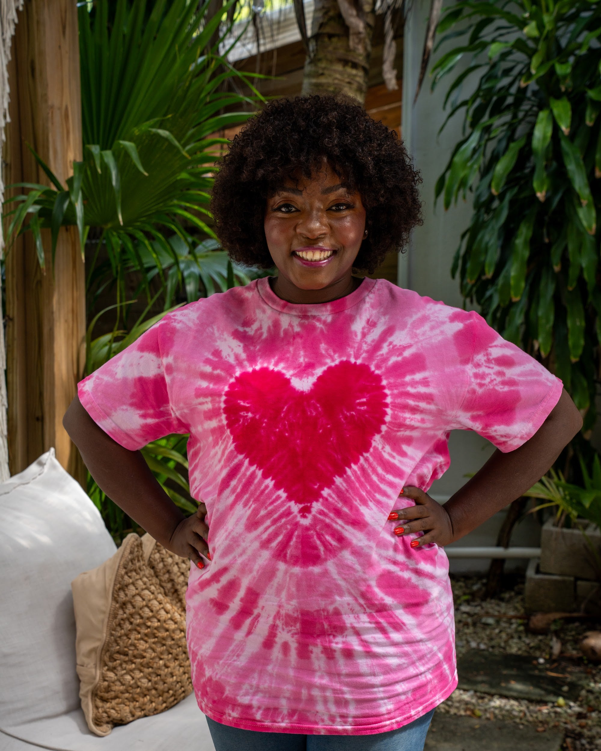 Pink Heart tie-dye tee on a plus-size model, front view